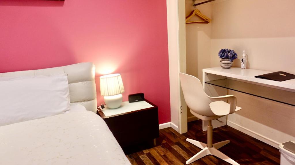 Postel nebo postele na pokoji v ubytování TL Warmest Homestay