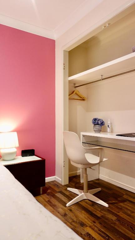 Postel nebo postele na pokoji v ubytování TL Warmest Homestay