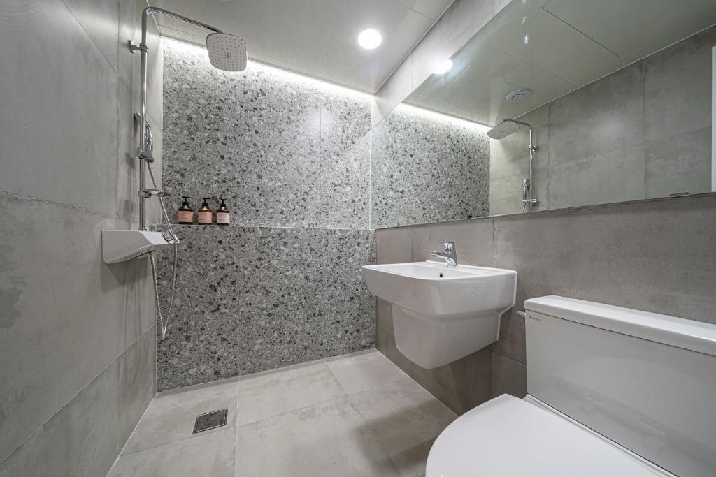 Koupelna v ubytování Aank Hotel Osan