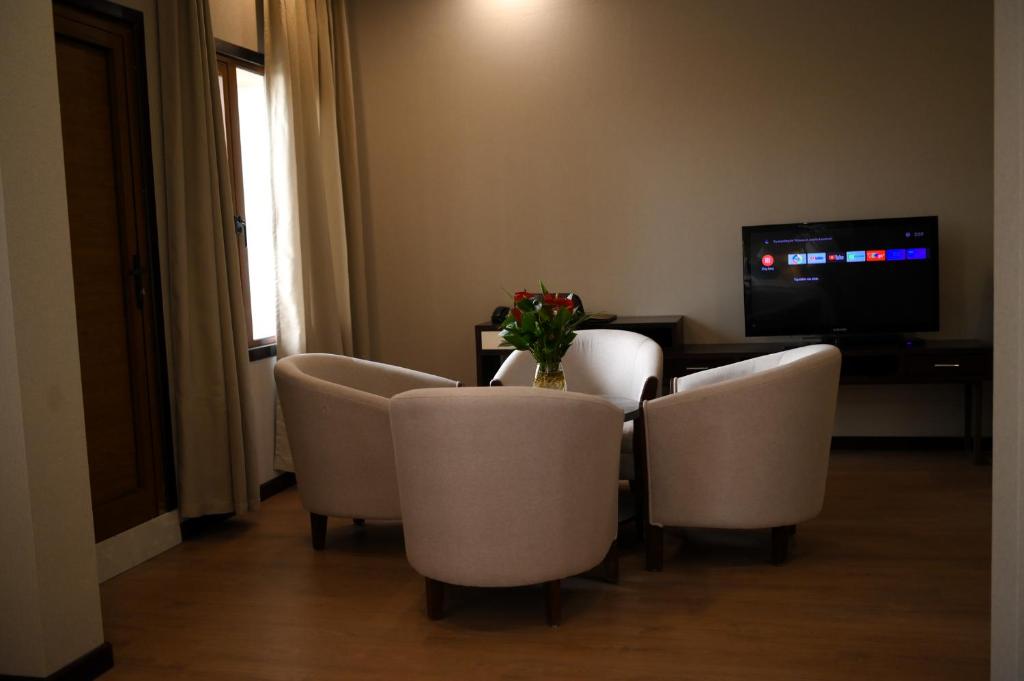 TV a/nebo společenská místnost v ubytování 东都明月酒店Dong Do Minh Nguyet