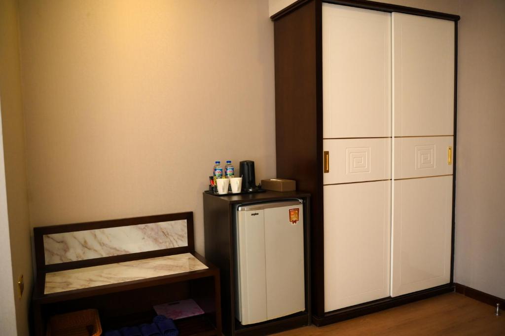 Kuchyň nebo kuchyňský kout v ubytování 东都明月酒店Dong Do Minh Nguyet