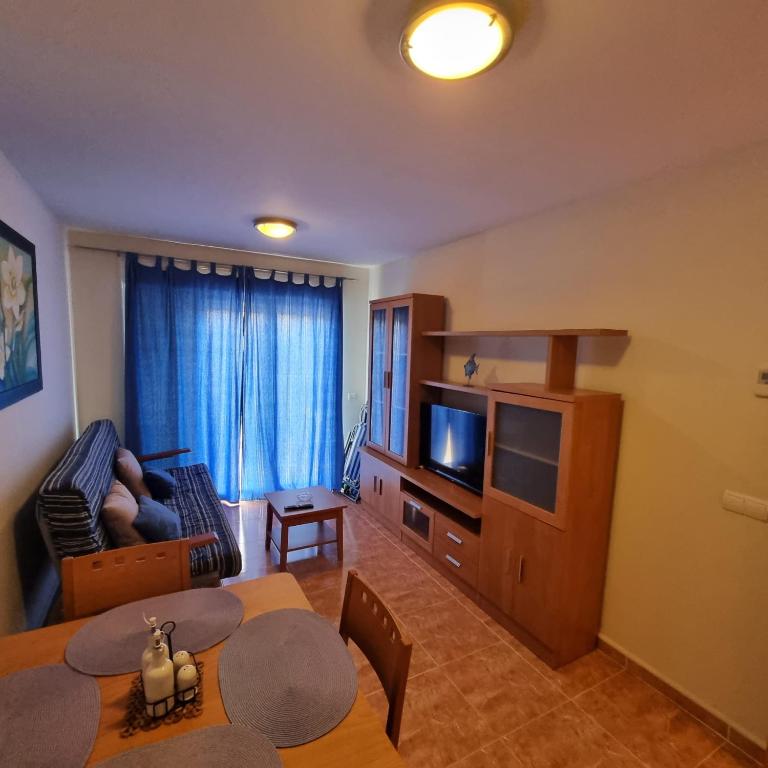 A kitchen or kitchenette at Ático dúplex con piscina privada en Vera Playa