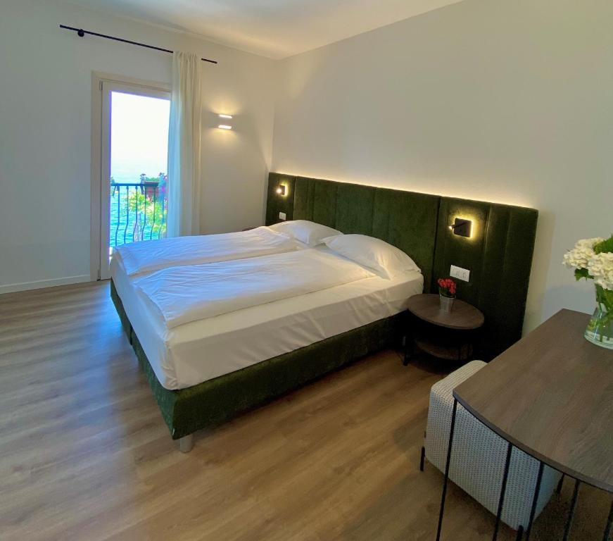Postel nebo postele na pokoji v ubytování Hotel Pai