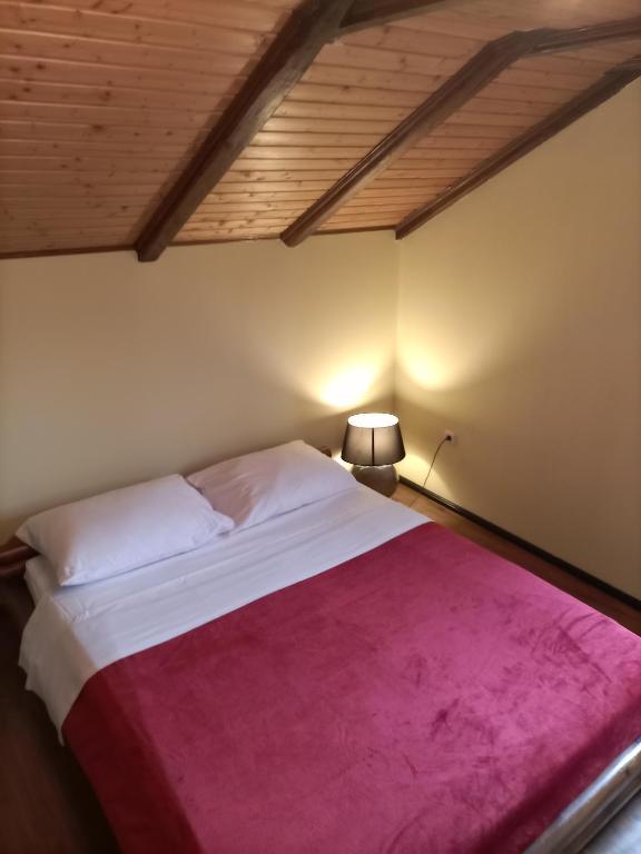 Postel nebo postele na pokoji v ubytování Apartments Ingrid