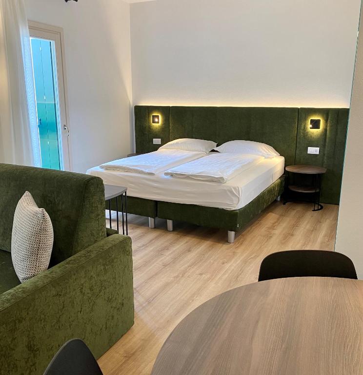 Postel nebo postele na pokoji v ubytování Hotel Pai