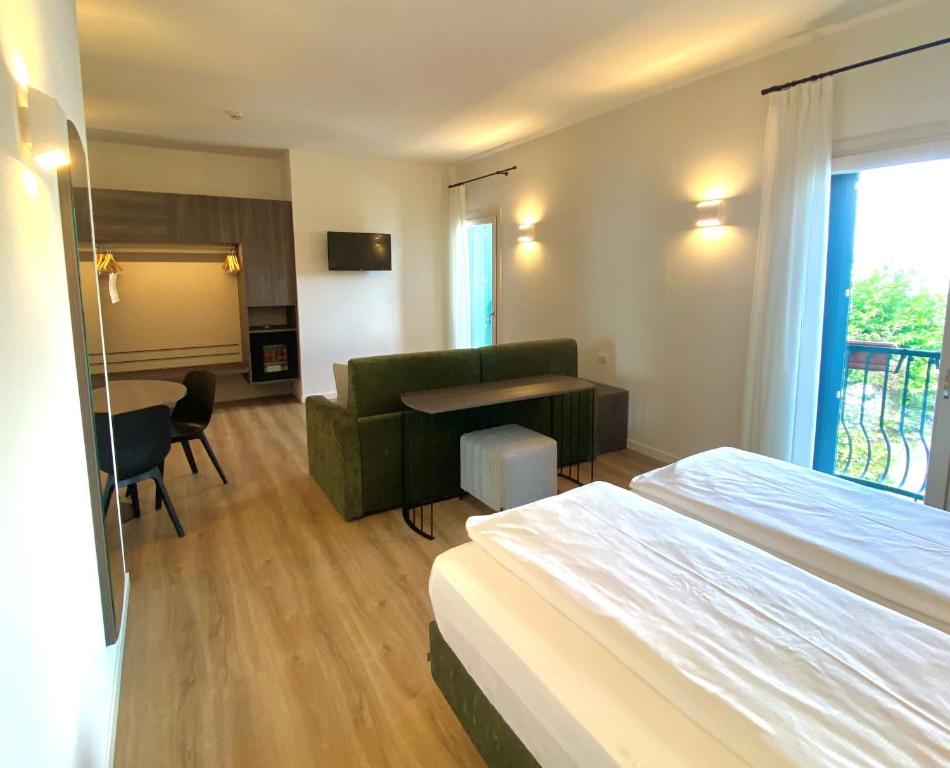Postel nebo postele na pokoji v ubytování Hotel Pai