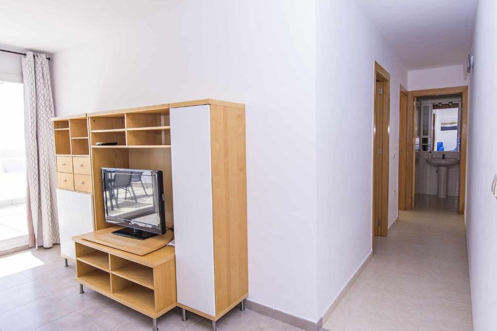 TV a/nebo společenská místnost v ubytování El Horizonte Piscina,Terraza y Vistas