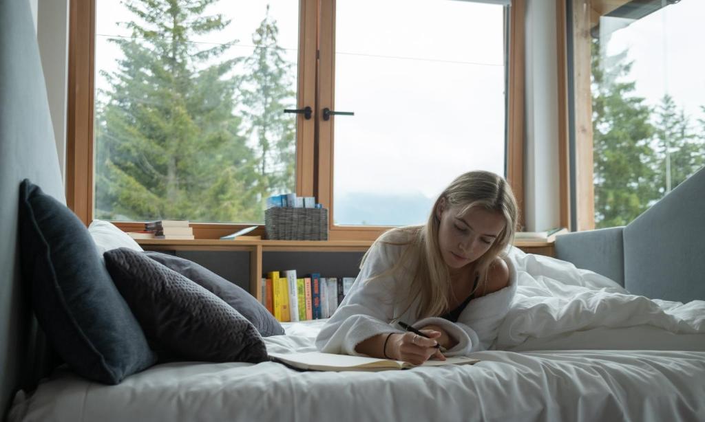 Postel nebo postele na pokoji v ubytování Lesehotel