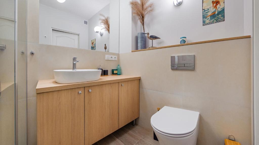 Kúpeľňa v ubytovaní Apartamenty Sun & Snow Legionów