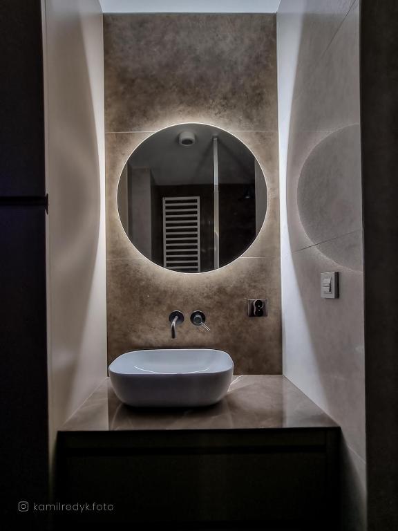 Koupelna v ubytování Apartament VIP PROMENADA