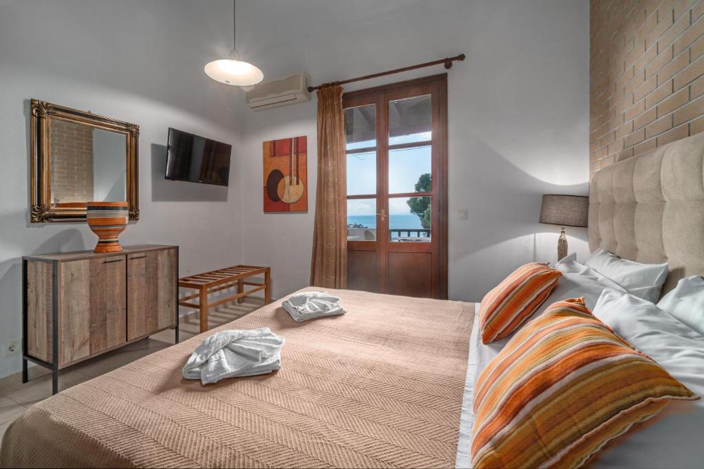 Postel nebo postele na pokoji v ubytování Margi House