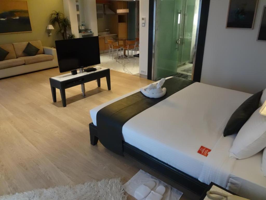 Postel nebo postele na pokoji v ubytování Mirage Hotel, Mumbai International Airport