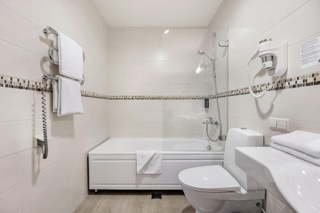 Koupelna v ubytování Euterpe Hotel
