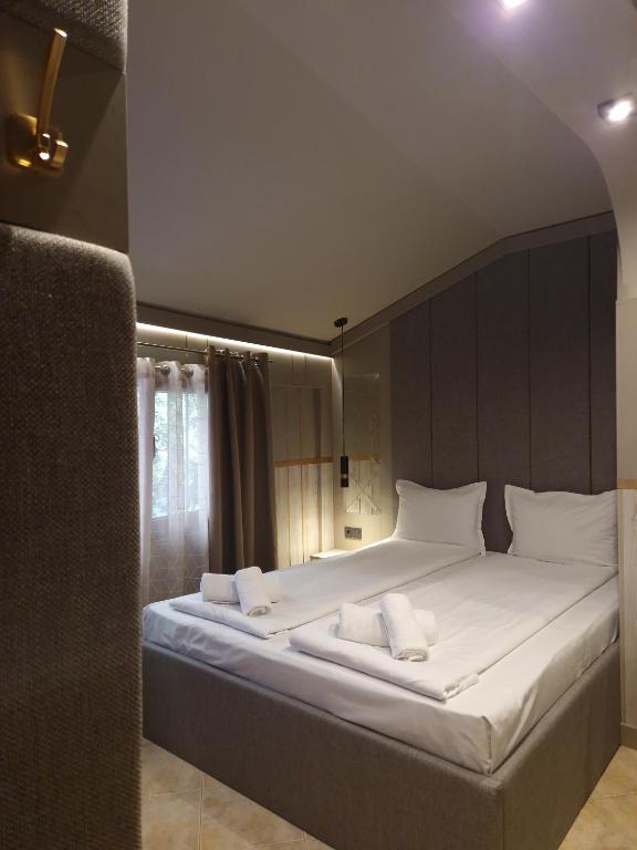Postel nebo postele na pokoji v ubytování Hotel Allur