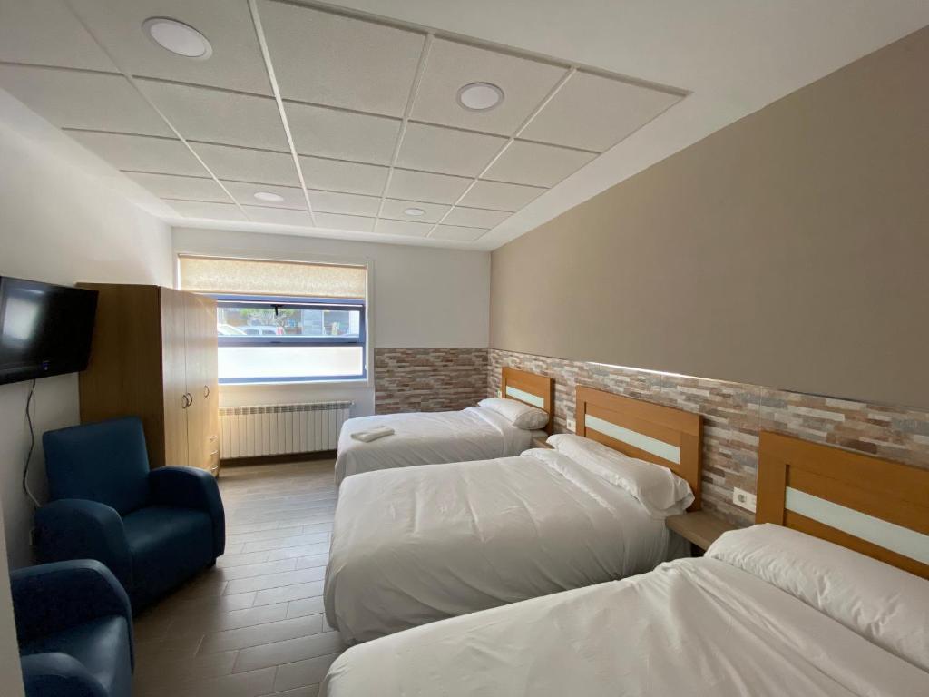 Postel nebo postele na pokoji v ubytování dpCristal El Rinconcito