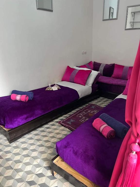 Postel nebo postele na pokoji v ubytování Riad 1001 couleurs
