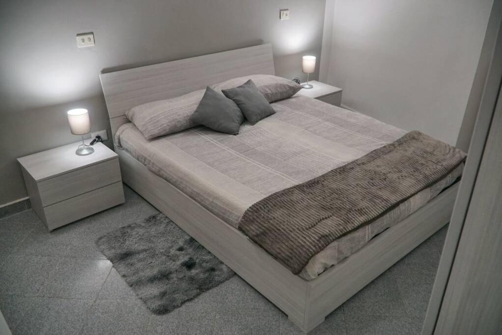 Katil atau katil-katil dalam bilik di Casa vacanze La corte