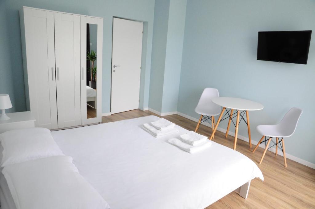 Postel nebo postele na pokoji v ubytování Casa Doris