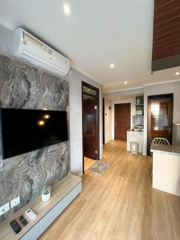 TV a/nebo společenská místnost v ubytování R20 Apartment Daymentroom 2BR 0620