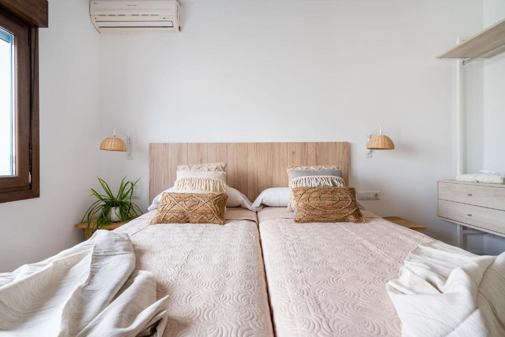 Posteľ alebo postele v izbe v ubytovaní BF Rooms Carboneras