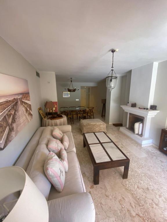 a living room with a couch with two babies laying on it at Apartamento guadalmina in Marbella