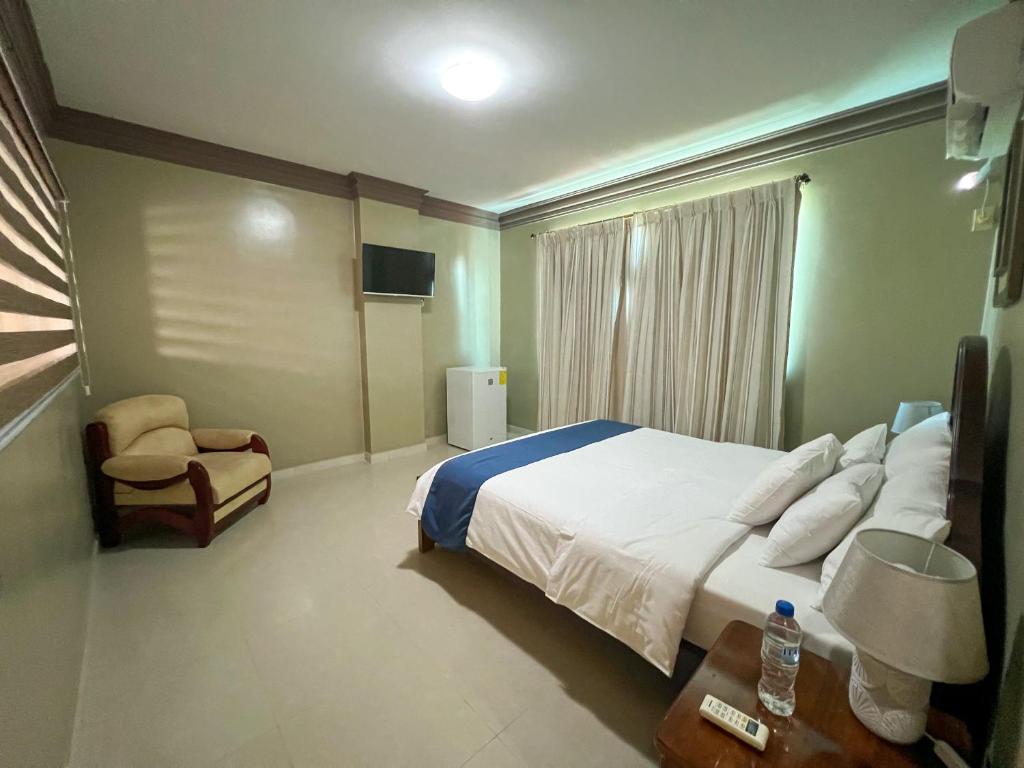 Postel nebo postele na pokoji v ubytování Apart Hotel Hamilton