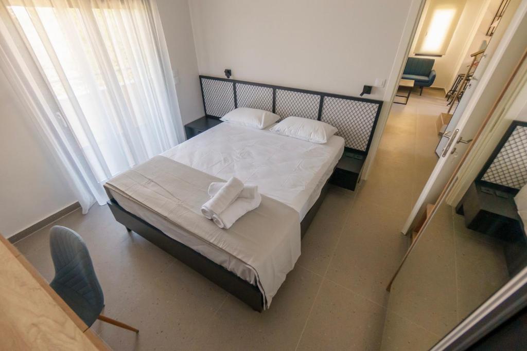 Postel nebo postele na pokoji v ubytování Lighthouse Apartments
