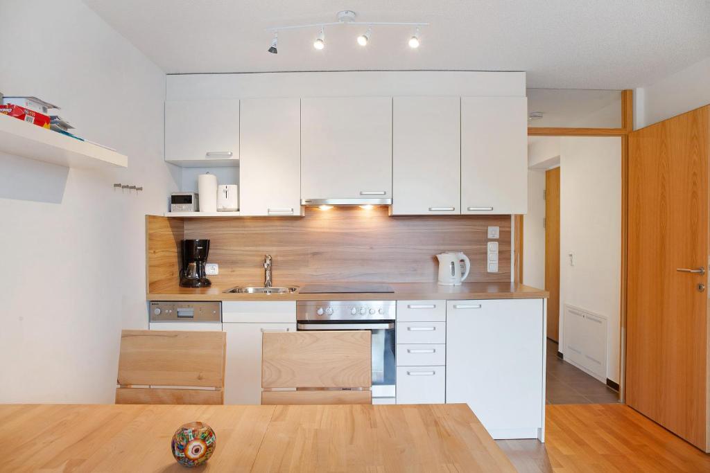 Kuchyň nebo kuchyňský kout v ubytování Ferienwohnung Maier - Fontanella