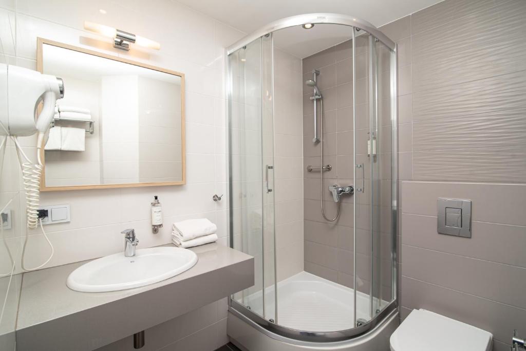 Koupelna v ubytování Antares Hotel