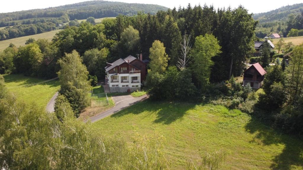 an aerial view of a house in the middle of a field at Penzion Jas in Luhačovice