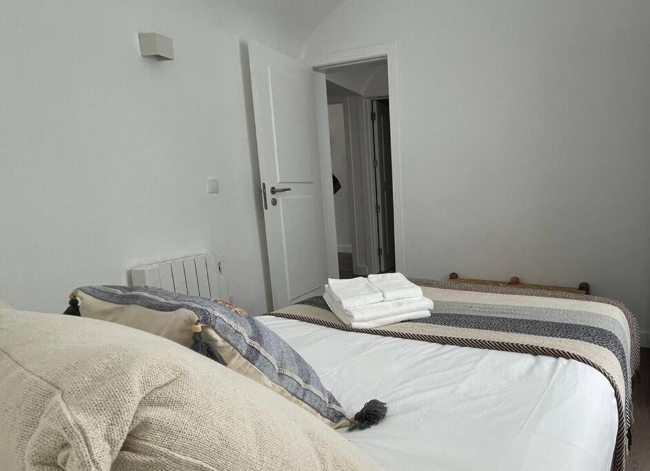 Postel nebo postele na pokoji v ubytování Casa da Travessa