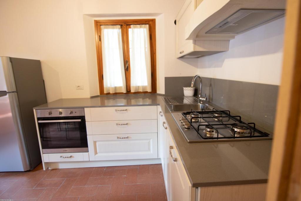 Kuchyň nebo kuchyňský kout v ubytování Agriturismo Poggio Nardini