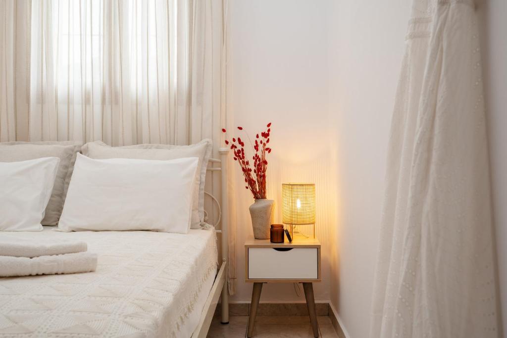 A bed or beds in a room at Orkos Naxian Wave 3