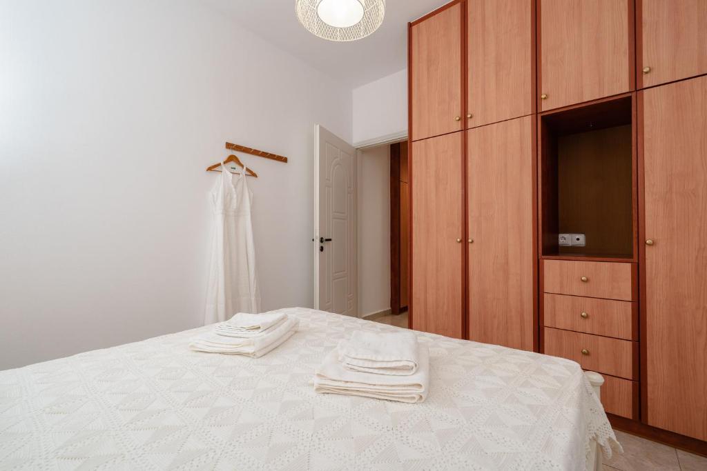 A bed or beds in a room at Orkos Naxian Wave 3