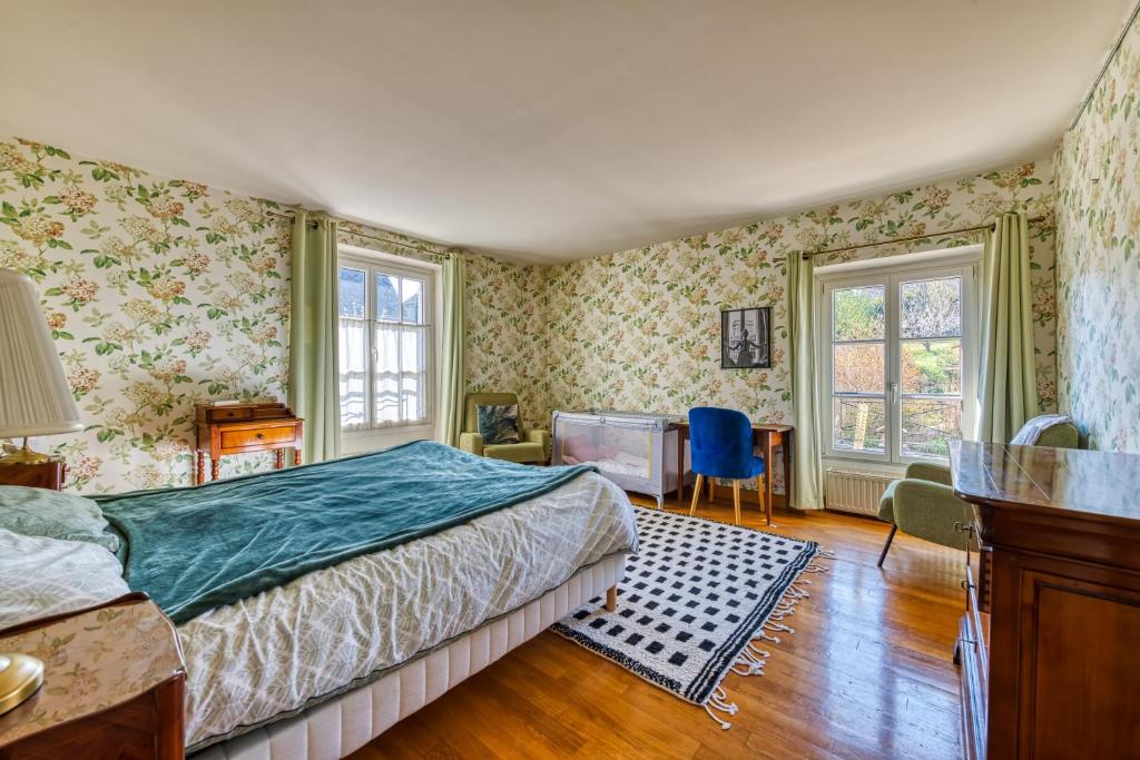 Posteľ alebo postele v izbe v ubytovaní Maison Prado - avec piscine privée et grand jardin