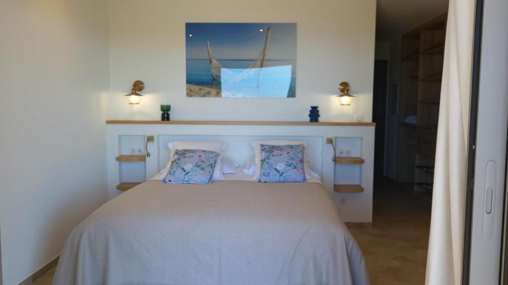 Postel nebo postele na pokoji v ubytování U San Daniellu villas et chambres
