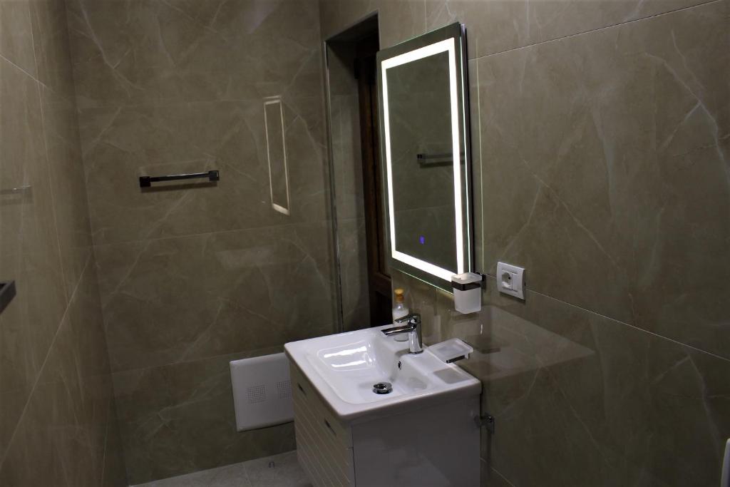 Koupelna v ubytování Hotel Vila Maledhi