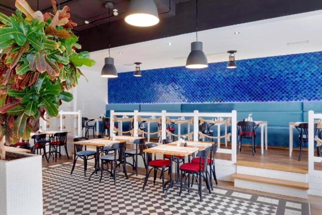 Reštaurácia alebo iné gastronomické zariadenie v ubytovaní Rezydencja Bielik