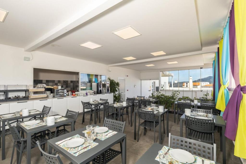 Restaurace v ubytování L'Essenza Hotel