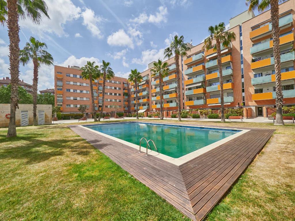 Bazén v ubytování Vila Olimpica Pool Suites nebo v jeho okolí