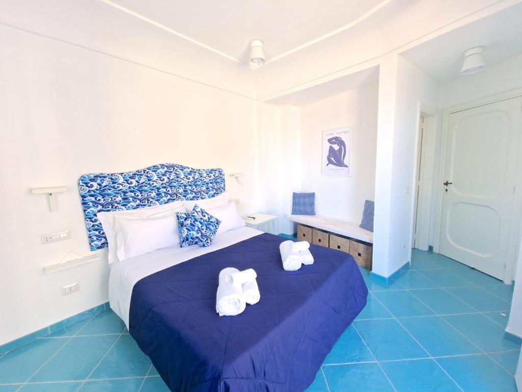 Voodi või voodid majutusasutuse Il Cantuccio Rooms toas