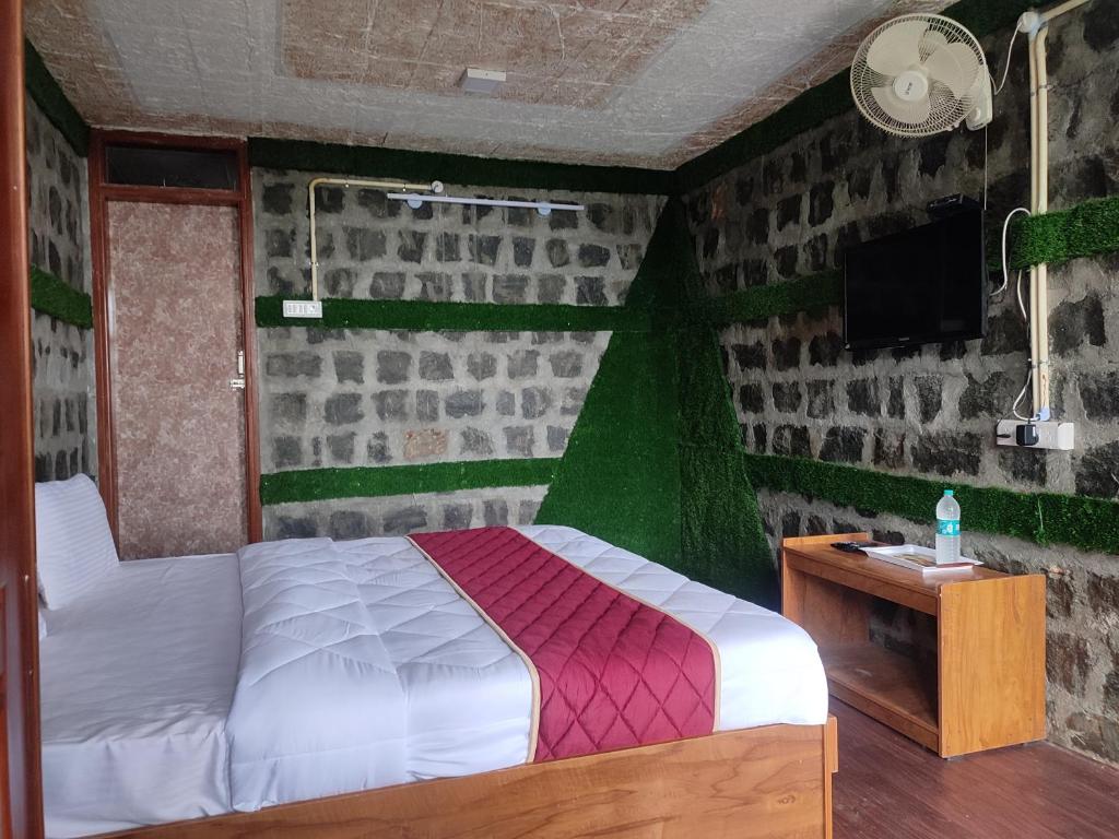 Postel nebo postele na pokoji v ubytování Cholai Resorts & Hotels