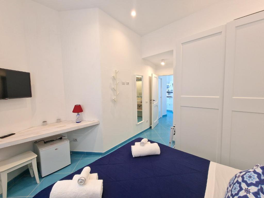 Voodi või voodid majutusasutuse Il Cantuccio Rooms toas