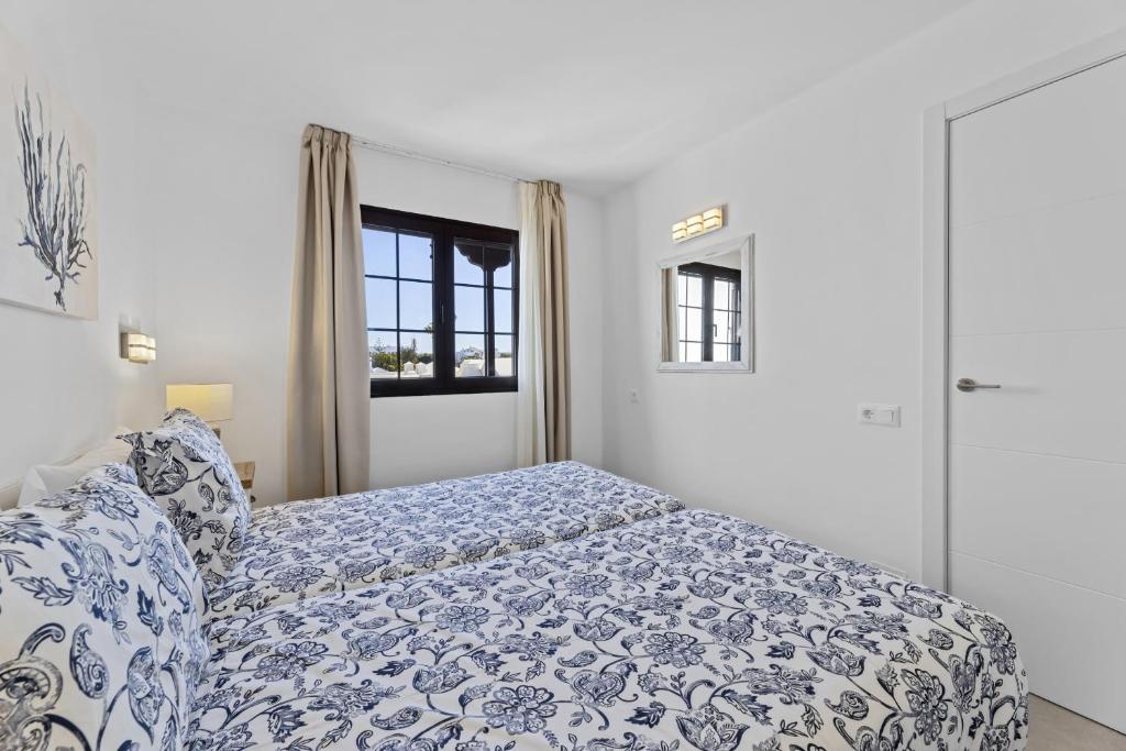 Postel nebo postele na pokoji v ubytování Casahost Bastian Boutique II Seaview