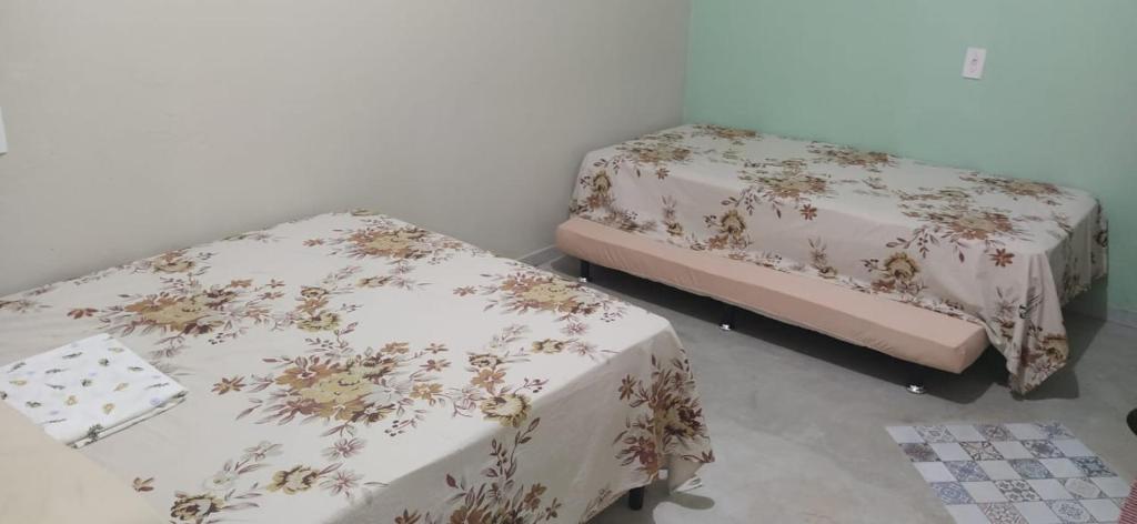 Postel nebo postele na pokoji v ubytování Casa Serrana beach Camocim