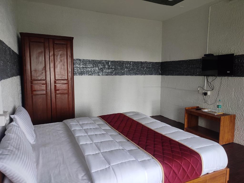 Postel nebo postele na pokoji v ubytování Cholai Resorts & Hotels