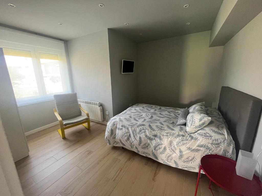 TV a/nebo společenská místnost v ubytování Apartamentos El Valle