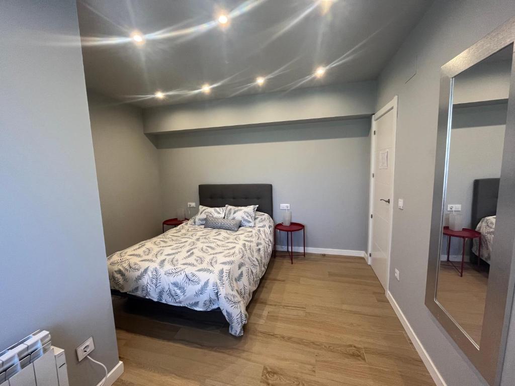 Postel nebo postele na pokoji v ubytování Apartamentos El Valle