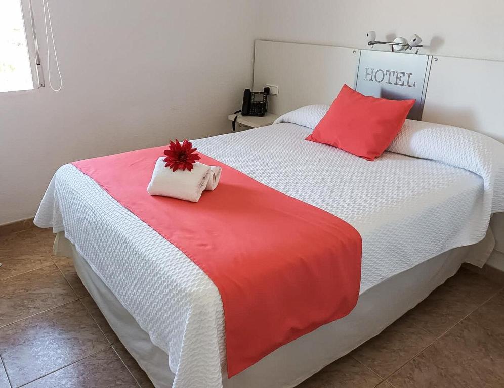 Postel nebo postele na pokoji v ubytování Hacienda Guadalquivir