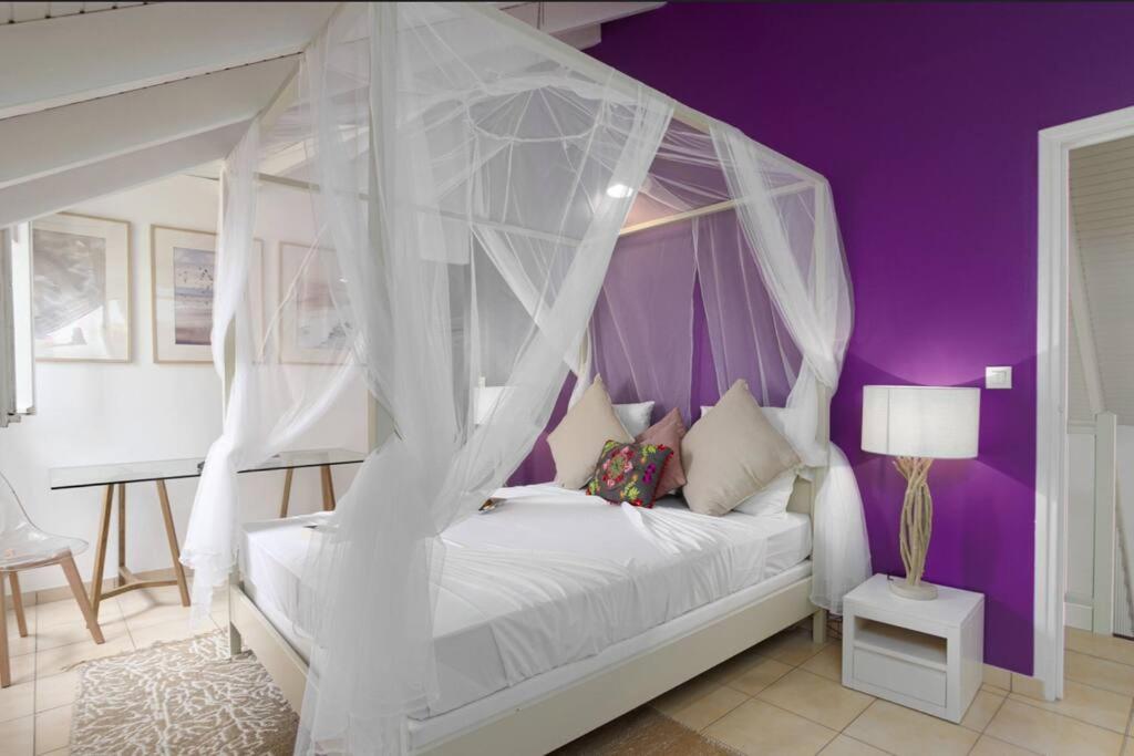 Postel nebo postele na pokoji v ubytování Villa Mango 150 mètres plage à pied
